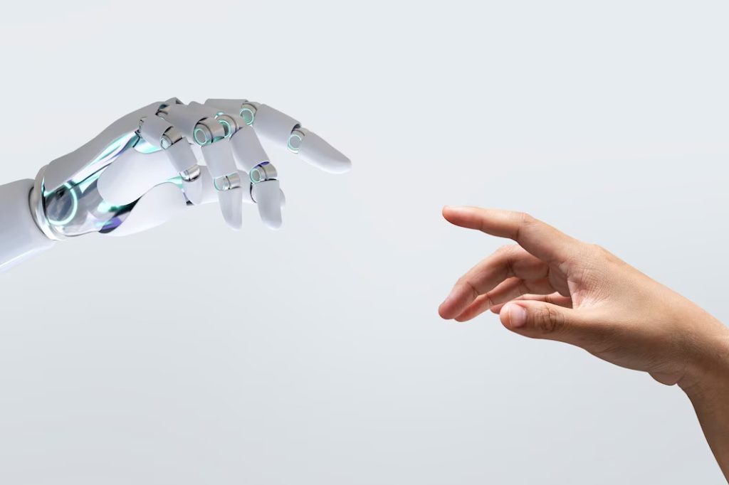 Artificial Intelligence concept with robot and human hand
