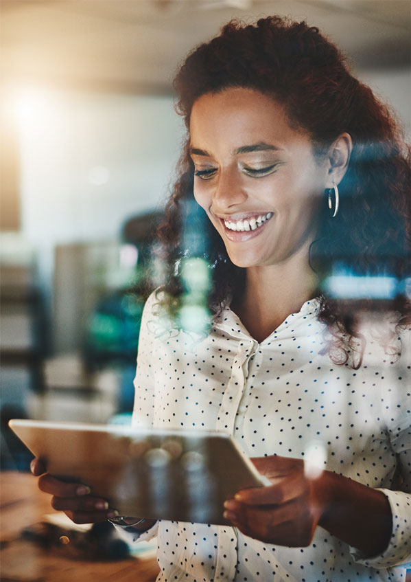 Young business woman using a digital tablet